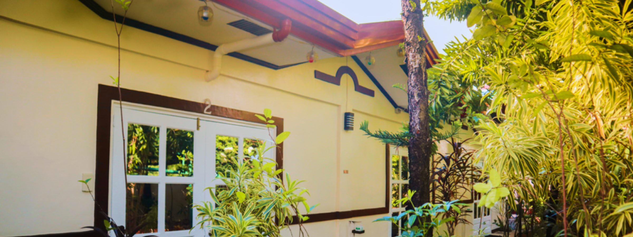 the frontage at Olana, its rooms opening onto the planted garden